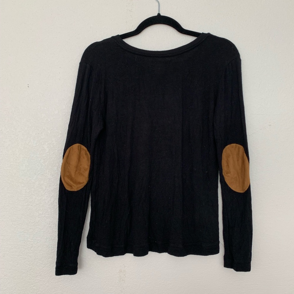 Black long sleeve top with professor elbow patch